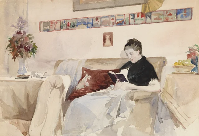 La esposa del artista leyendo en el sofá