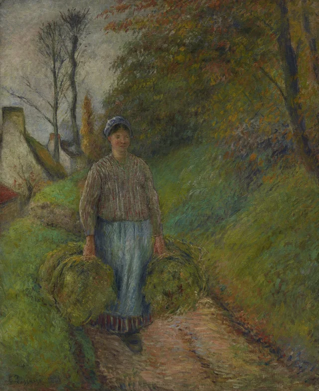 Campesina llevando dos fardos de heno