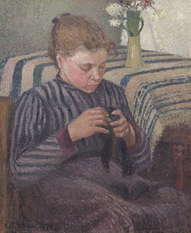 Mujer remendando