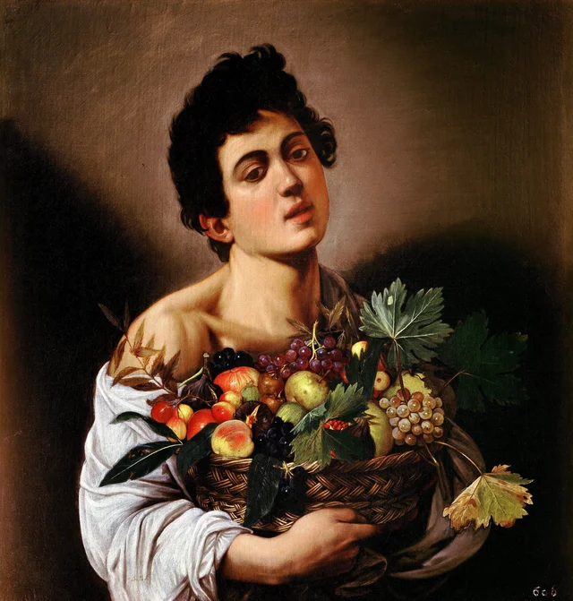 Muchacho con un cesto de frutas
