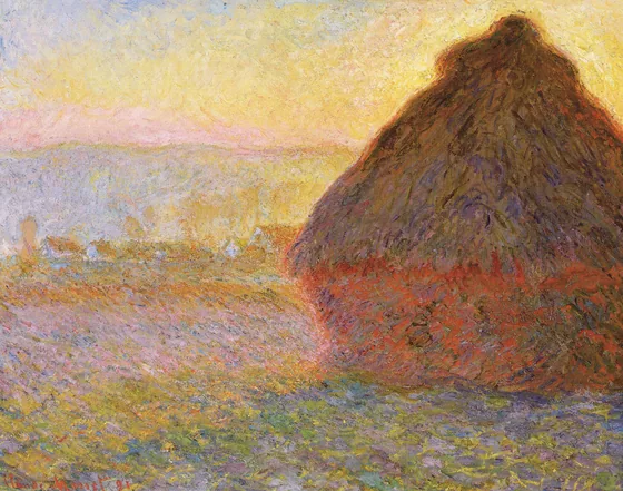 meule de paille au coucher du soleil