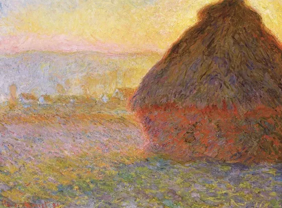 meule de paille au coucher du soleil