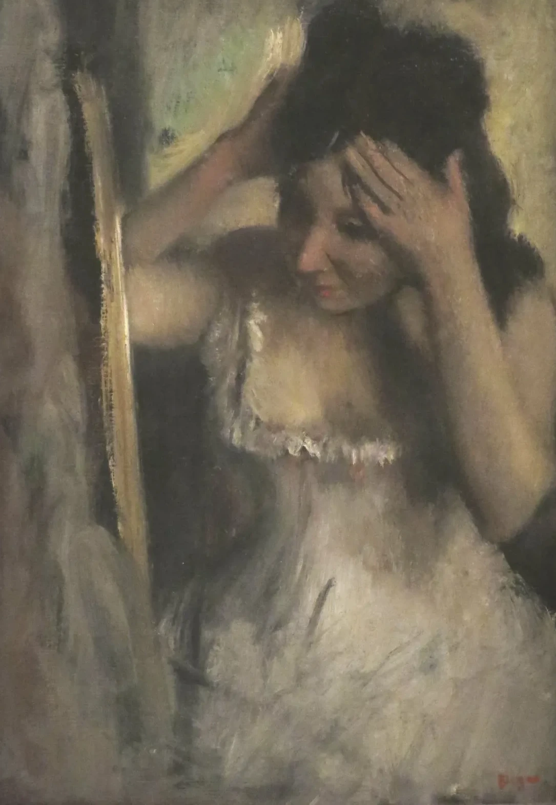 Femme se coiffant devant son miroir, Edgar Degas
