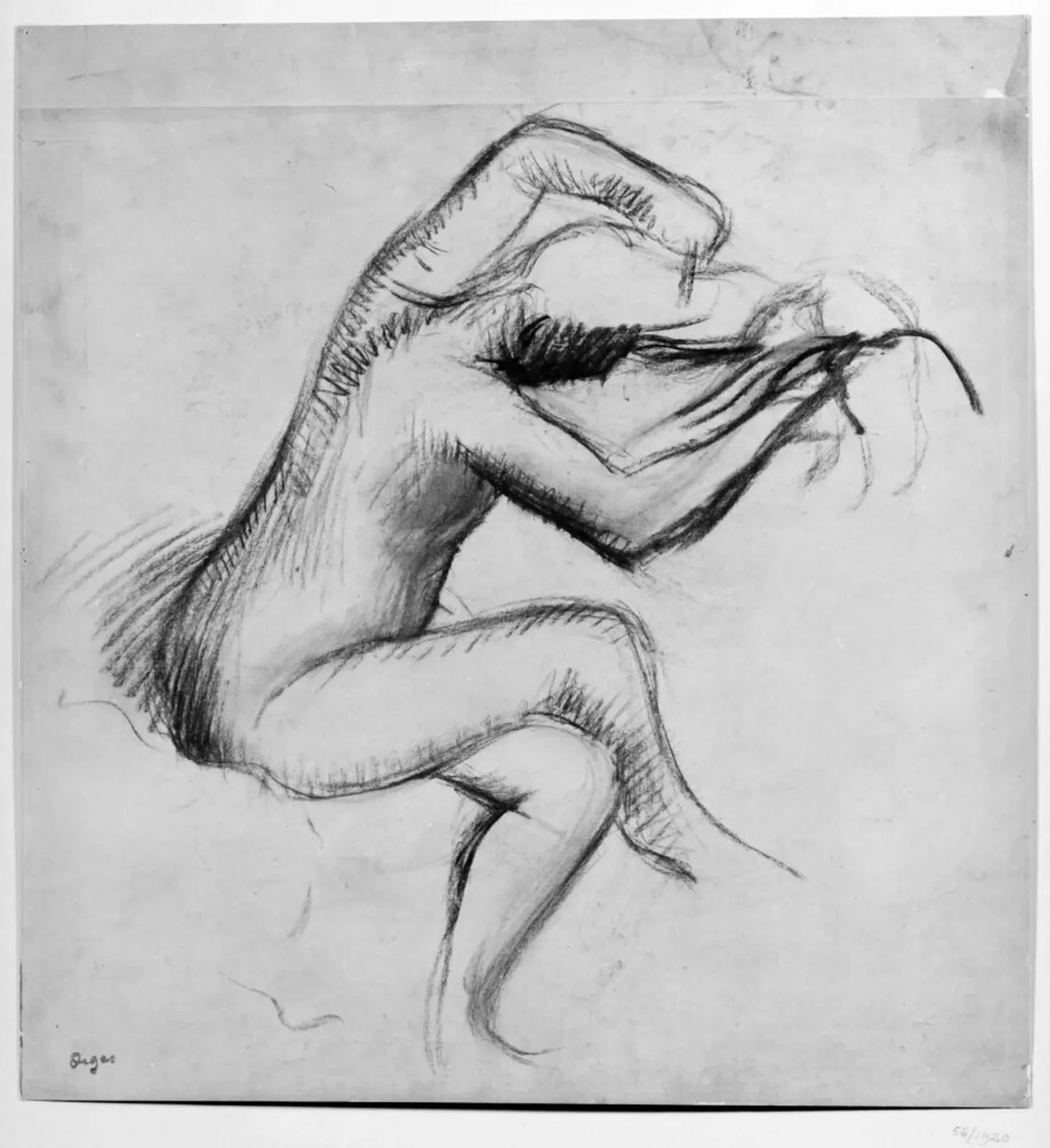 Woman combing her hair, Edgar Degas