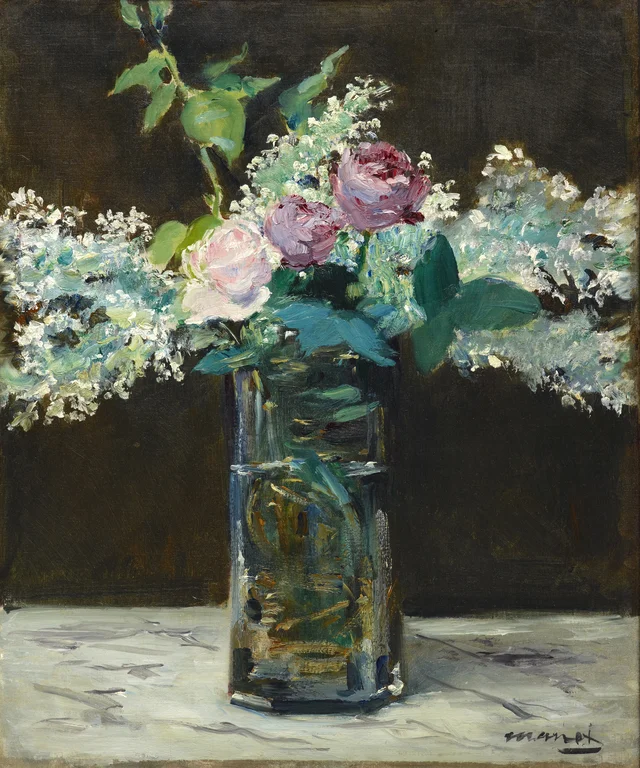 Vase de lilas et de roses blanches