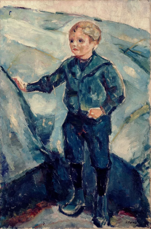 青い服の少年