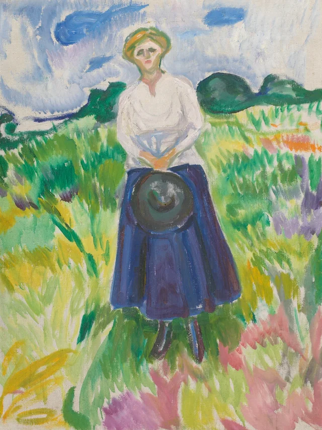 Mujer en la pradera verde