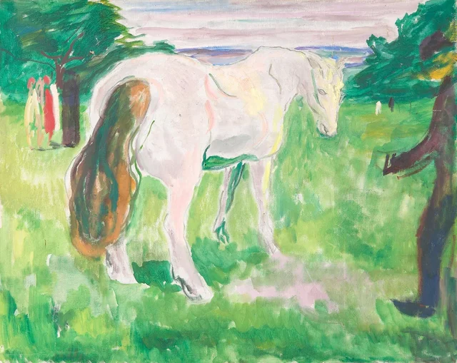 Caballo blanco en un prado verde