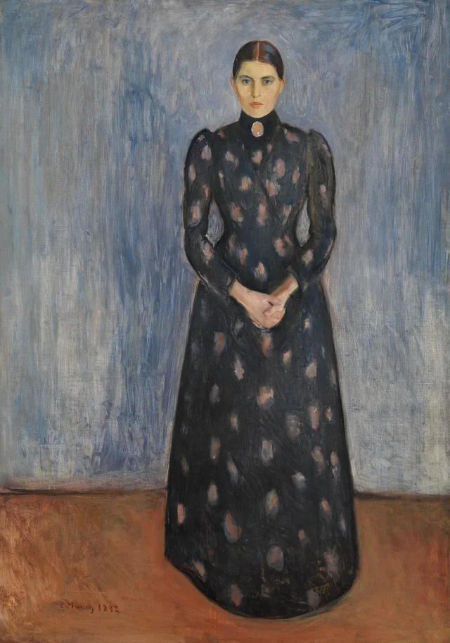 Inger de negro y violeta
