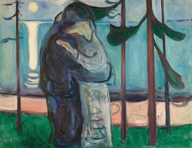 Beso en la orilla a la luz de la luna