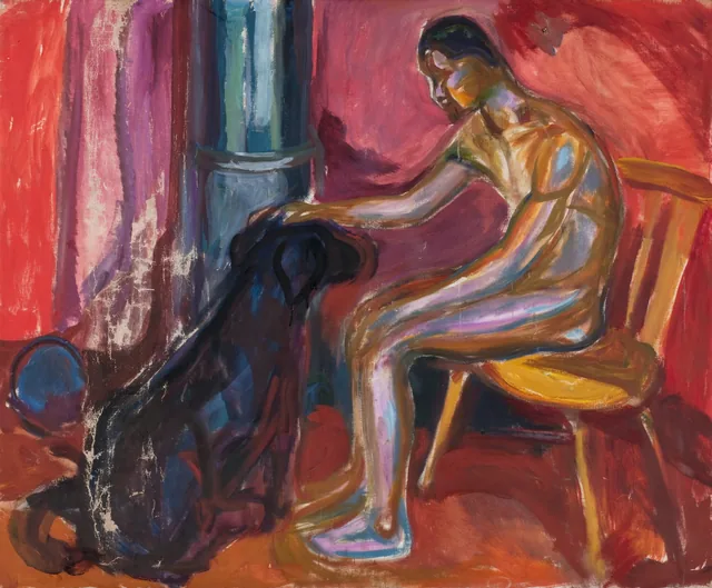 犬と座る裸の男
