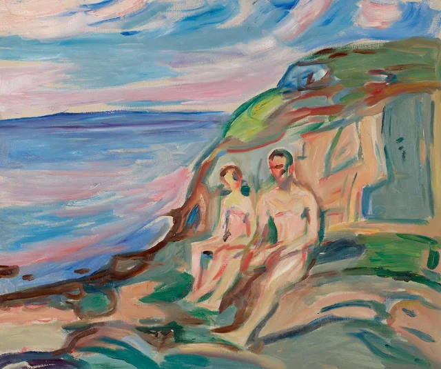 Bañistas de sol sobre las rocas
