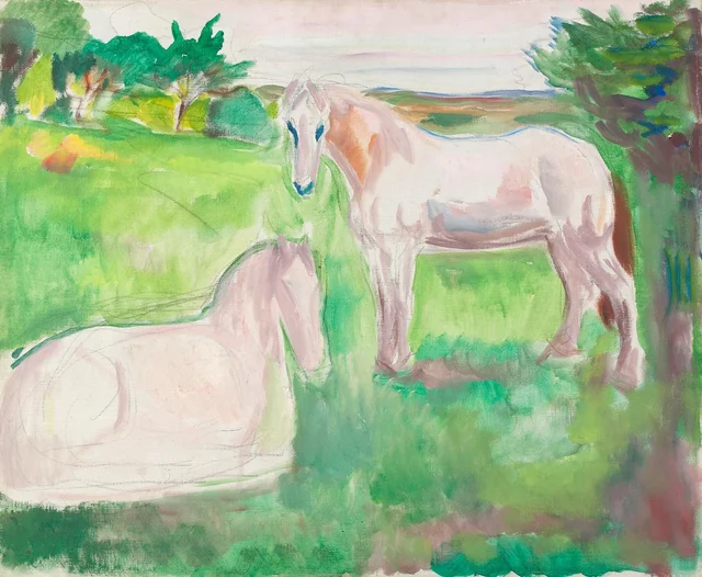 Dos caballos blancos en un prado verde