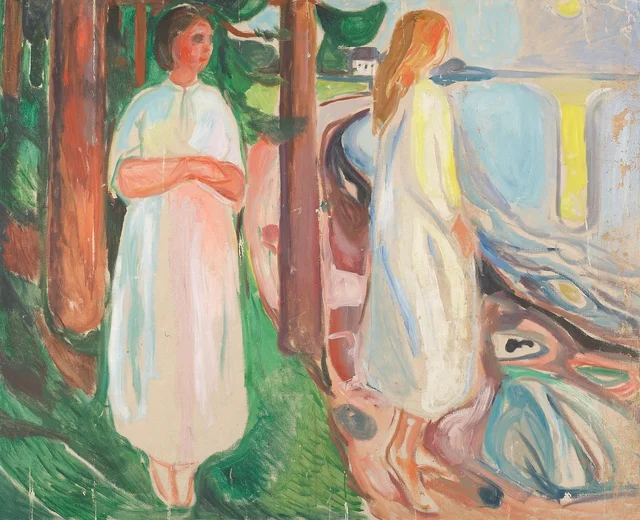Dos mujeres de blanco en la playa