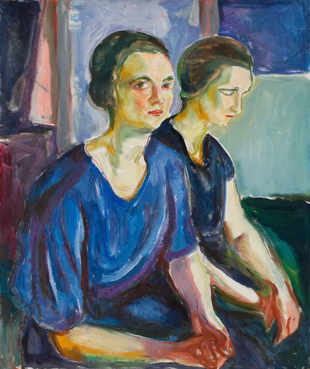 Dos mujeres sentadas
