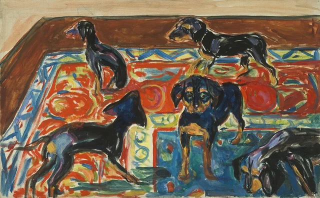 Cinco cachorros sobre la alfombra