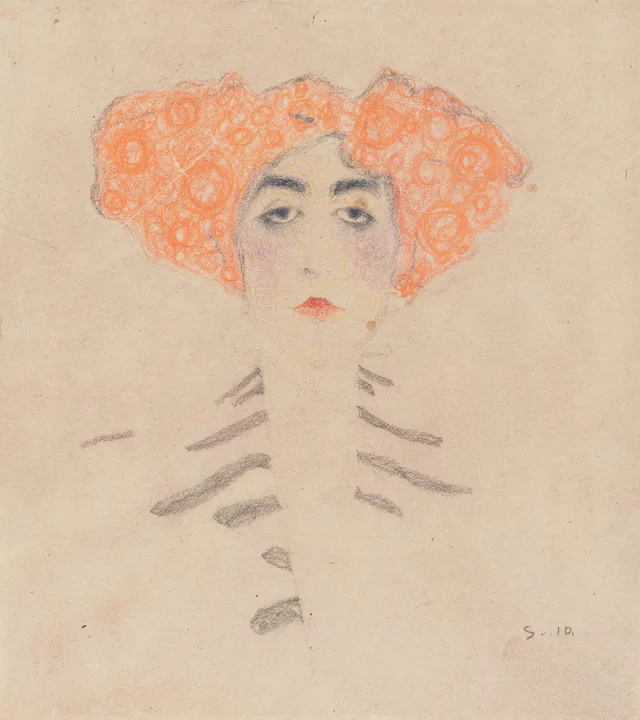 Jeune fille aux cheveux frisés orange