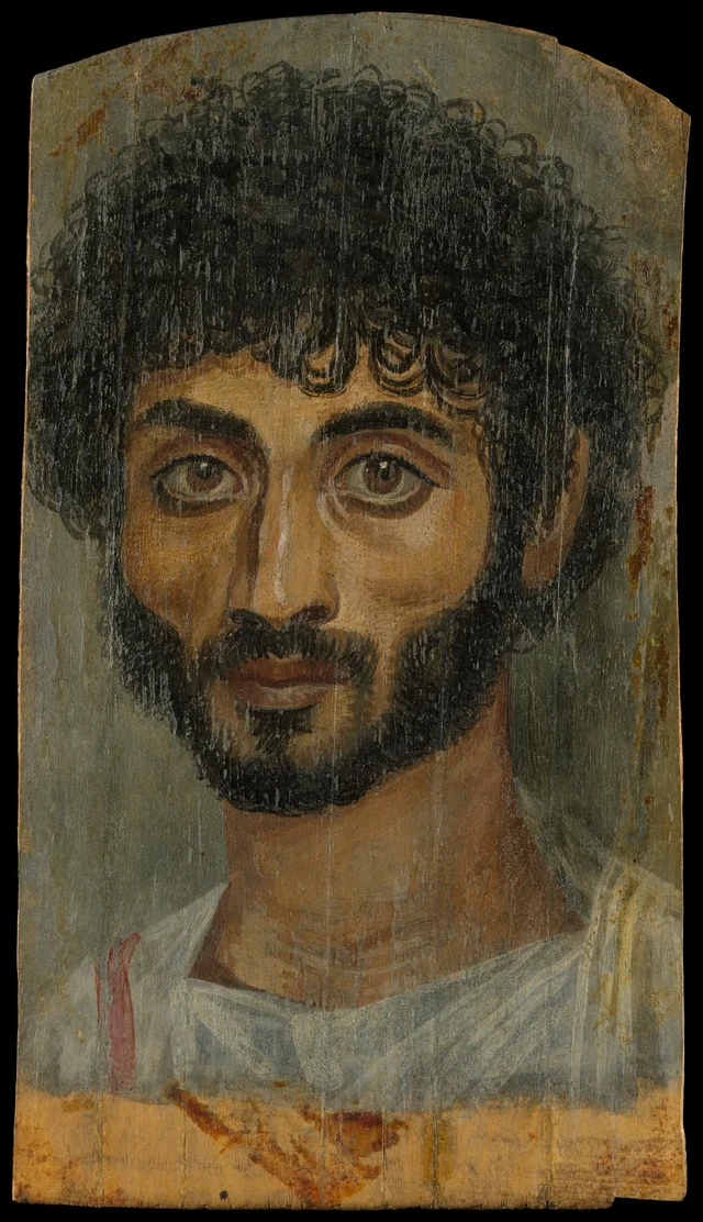 Portrait of a thin-faced, bearded man