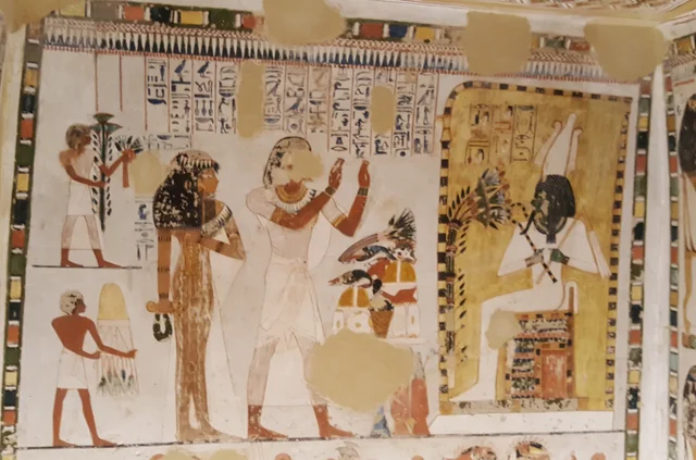 Menna et son épouse devant Osiris