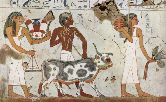 Offering bearers and an ox
