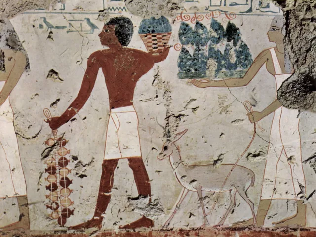 Offering bearers with a gazelle