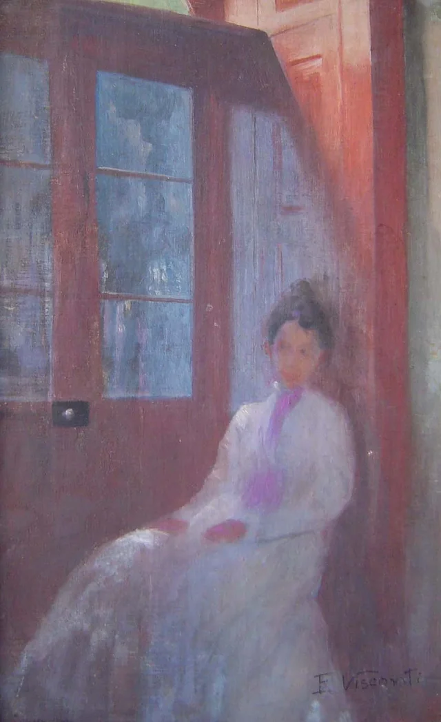 Muchacha en la puerta