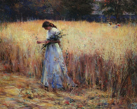Jeune fille dans le champ de blé