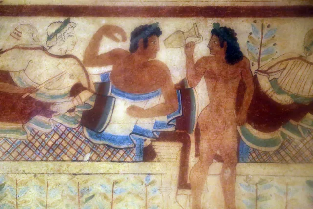 Reclining banqueter and young servant