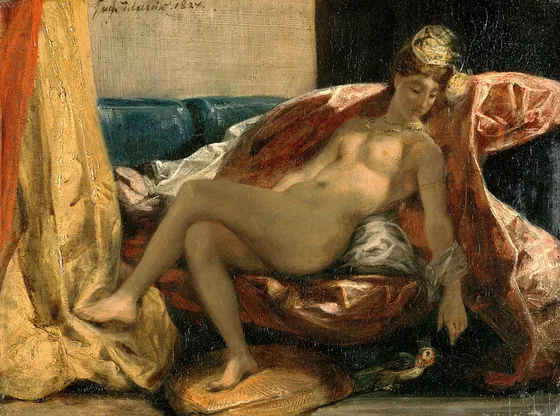 Femme caressant un perroquet