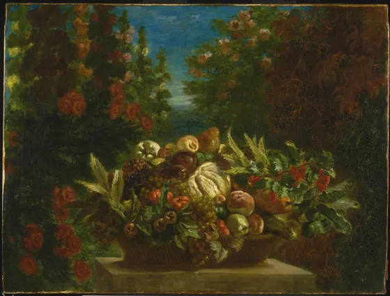 Panier de fruits dans un jardin fleuri