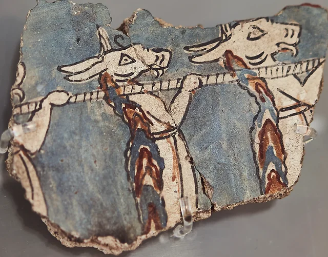 Donkey-headed demons carrying a pole (Mycenae)