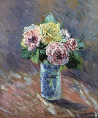 Roses jaunes et rouges dans un vase de cristal