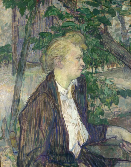 Femme assise dans un jardin