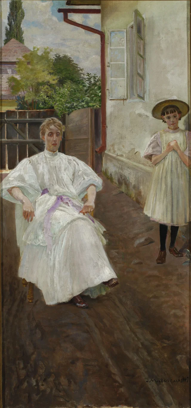 Diante da casa, a esposa e a filha do artista