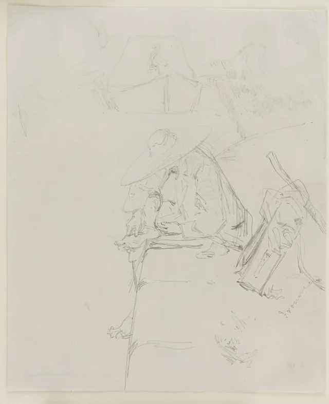 A man seated on the edge of a wall