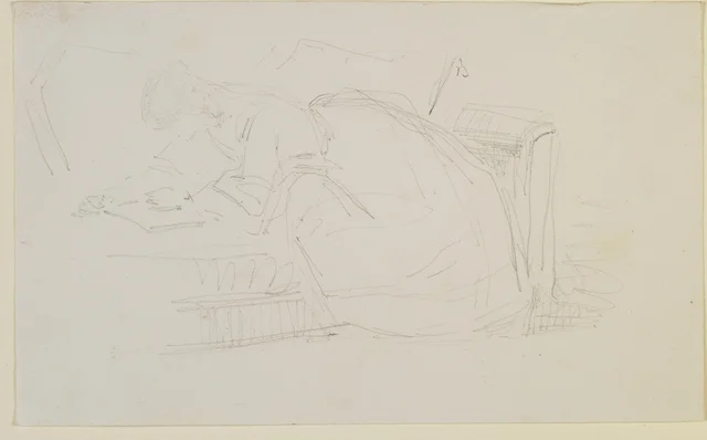 A girl reclining on a couch, reading