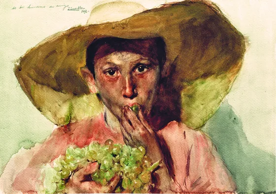 Enfant mangeant des raisins