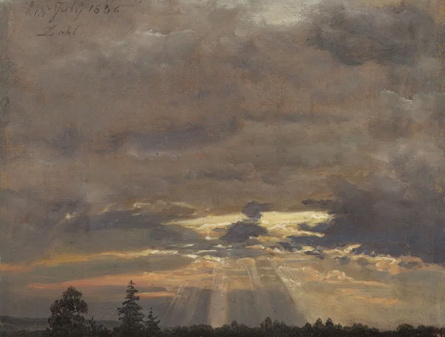 Cielo de tormenta con rayos de sol
