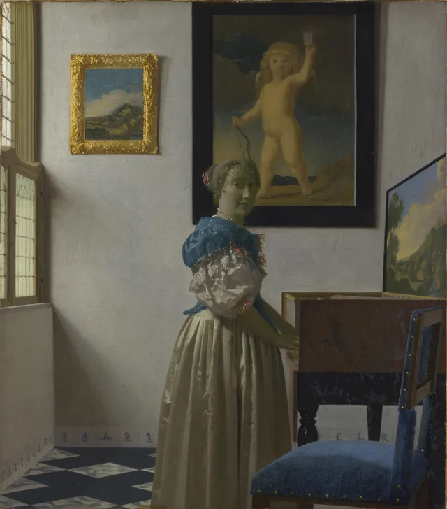 A Young Woman standing at a Virginal