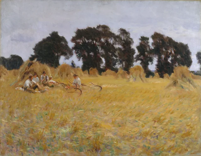 Segadores descansando en un campo de trigo