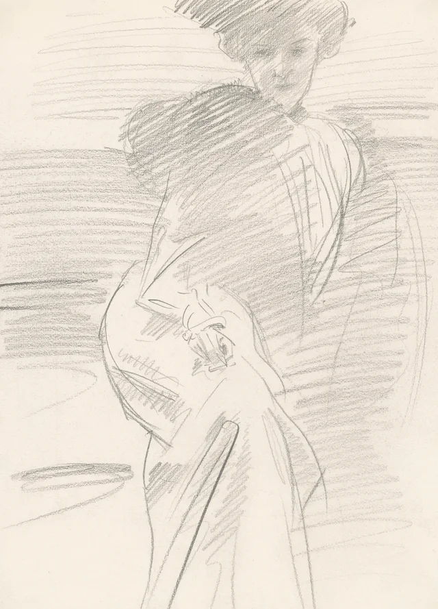 座る女