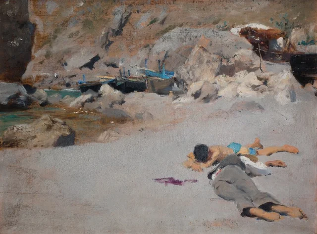 Dos muchachos en una playa con barcas
