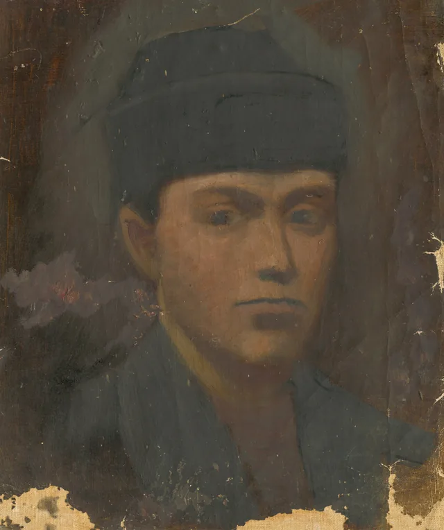 Cabeza de muchacho con gorro de piel negro