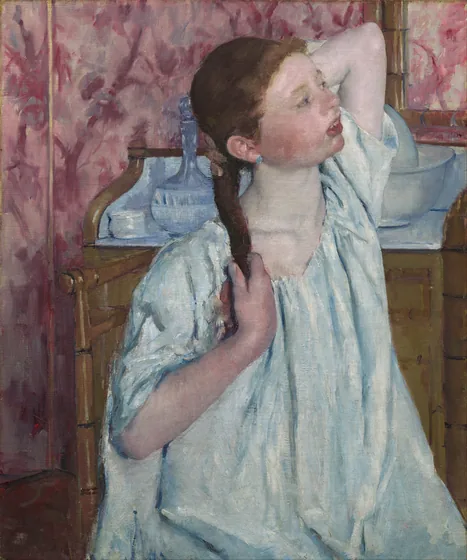Girl Arranging Her Hair