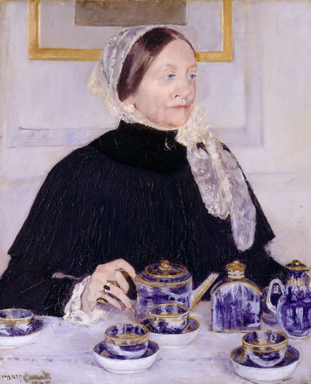 Dama ante su mesa de té