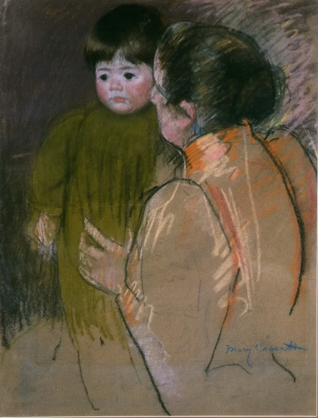 Mujer sosteniendo a un niño