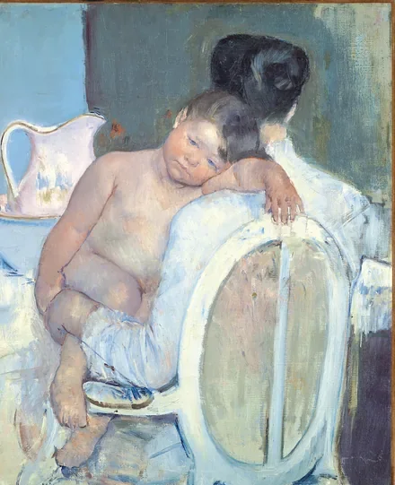 Woman Sitting with a Child in Her Arms
