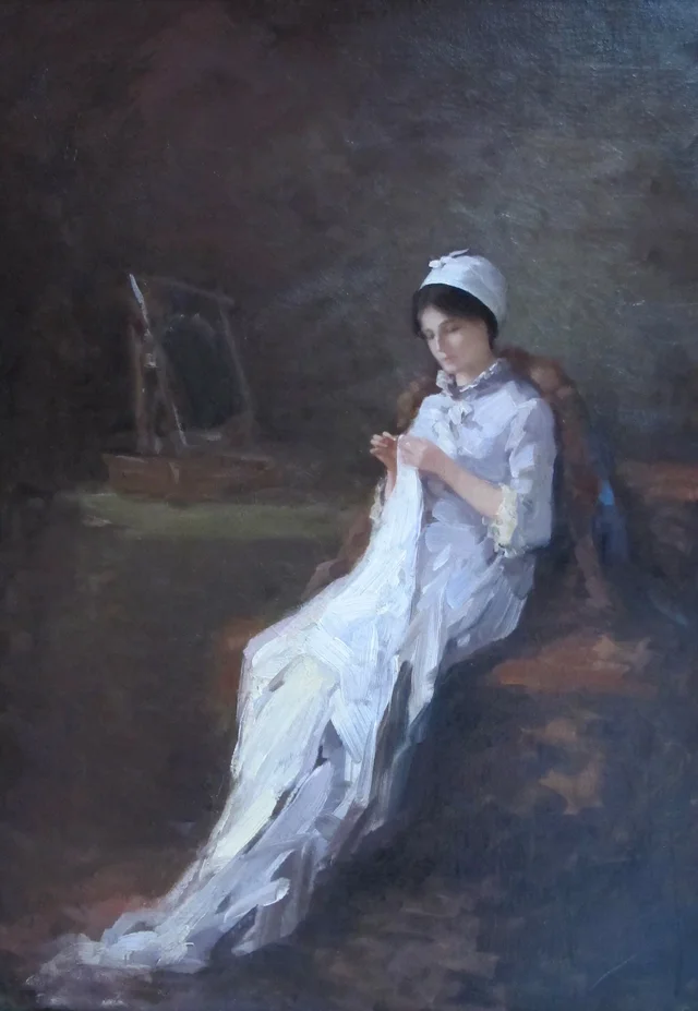 Femme cousant