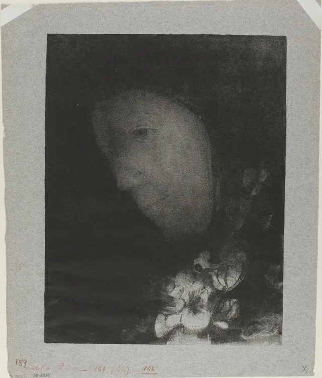 Tête de femme au corsage fleuri