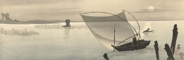 Bateaux de pêche sous la pleine lune